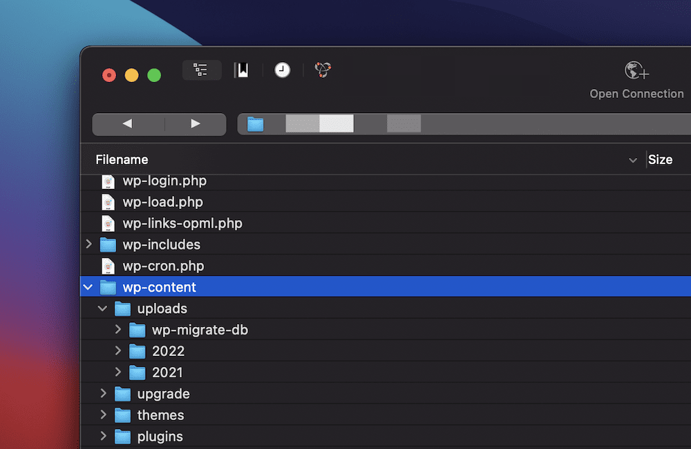 The Cyberduck interface showing the wp-content > uploads folder.